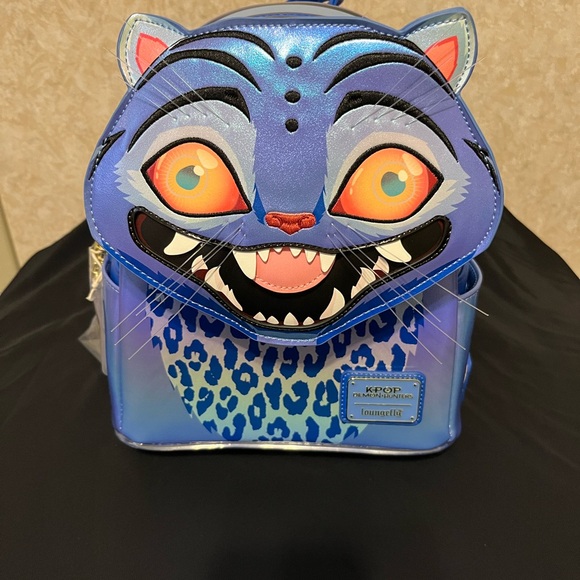 Disney Loungefly Handbags - Loungefly Holographic Blue and Purple K-POP DEMOM HUNTERS DERPY TIGER!!!